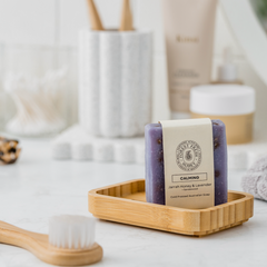 Calming natural Jarrah honey, lavender and sandalwood in a clean neat bathroom. 