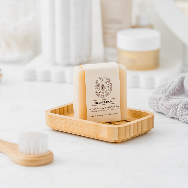 Natural Relaxation Jarrah honey soap with white clay in clean bathroom