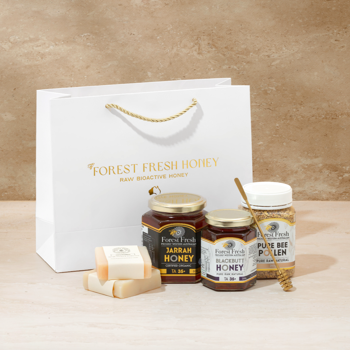 Premium raw honey jars with honey gifts such as soap and dipper