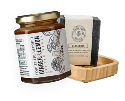 A soap bar and a jar of honey lemon.